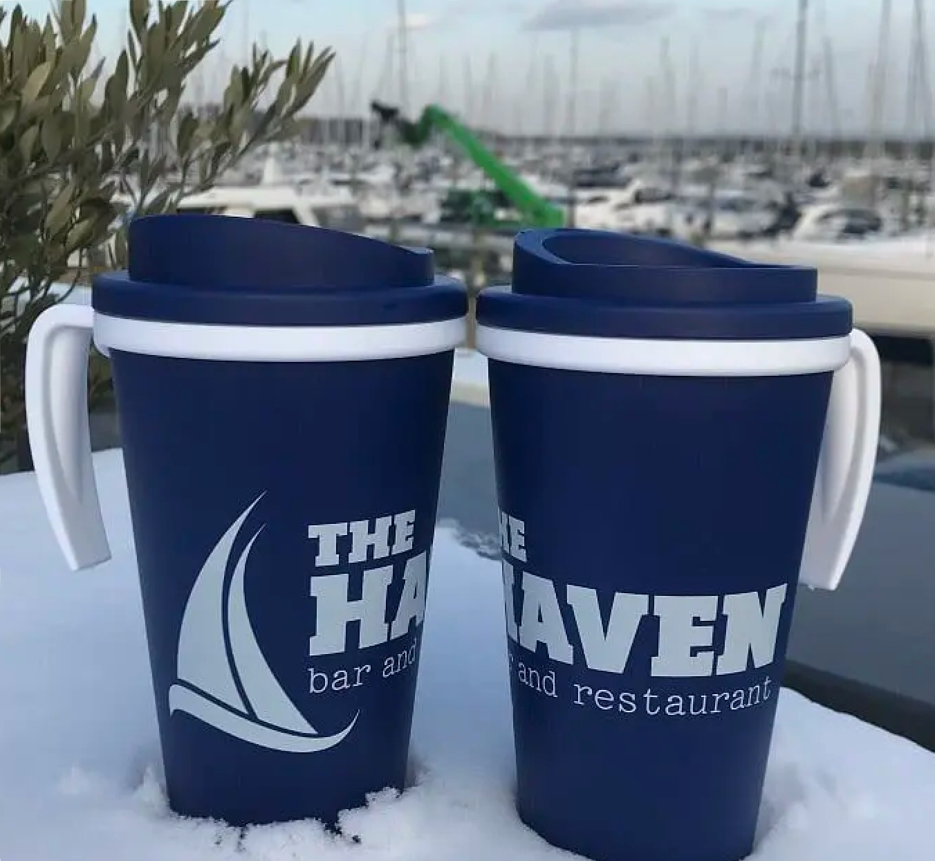 The Haven Bar and Restarant reuseable thermos mugs.