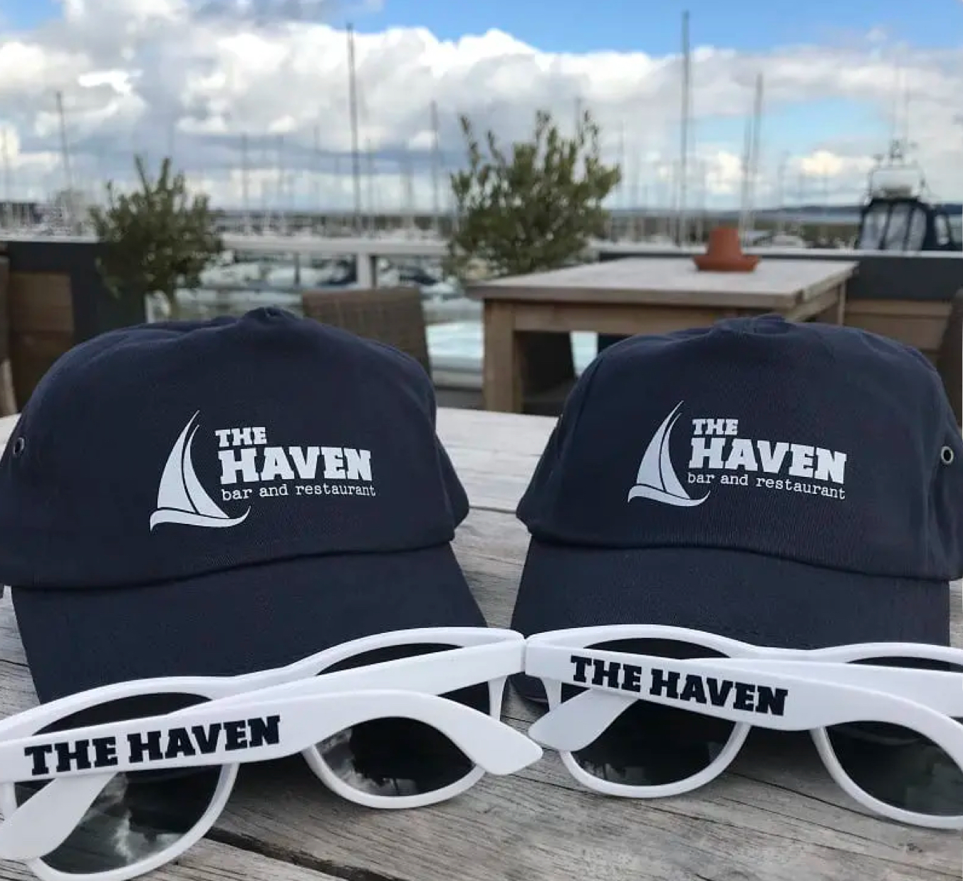 The Haven Bar and Restaurant sunglasses and caps.